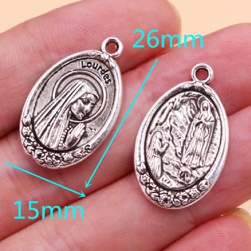 Vintage Christian Tag Pendants - Vintage Fashion Labels recensie en prijs